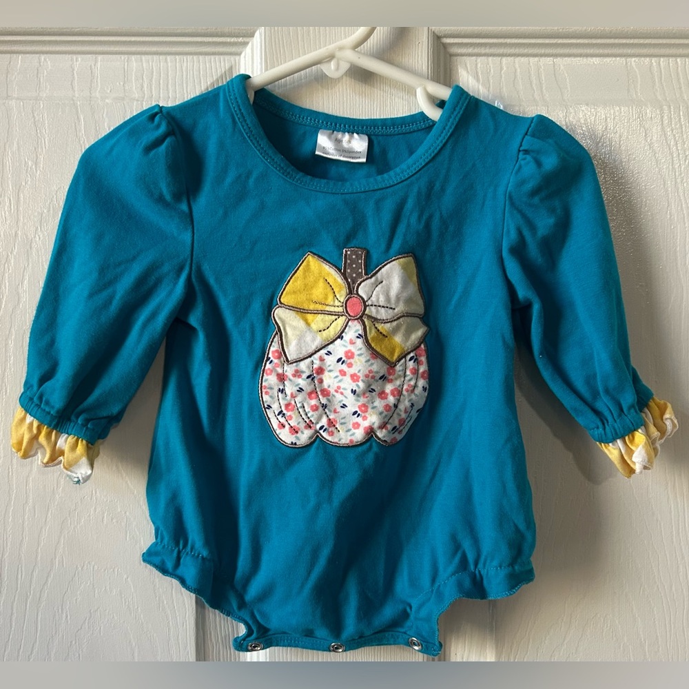 Honey Bean Teal Baby Onesie with Bow and Pumpkin Design